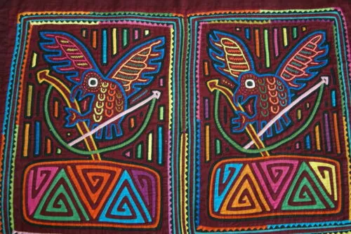 Kuna Indian Folk Art Mola blouse panel from San Blas Islands, Panama. Hand stitched Applique: Birds and Bow & Arrow 20" x 14" (65A)